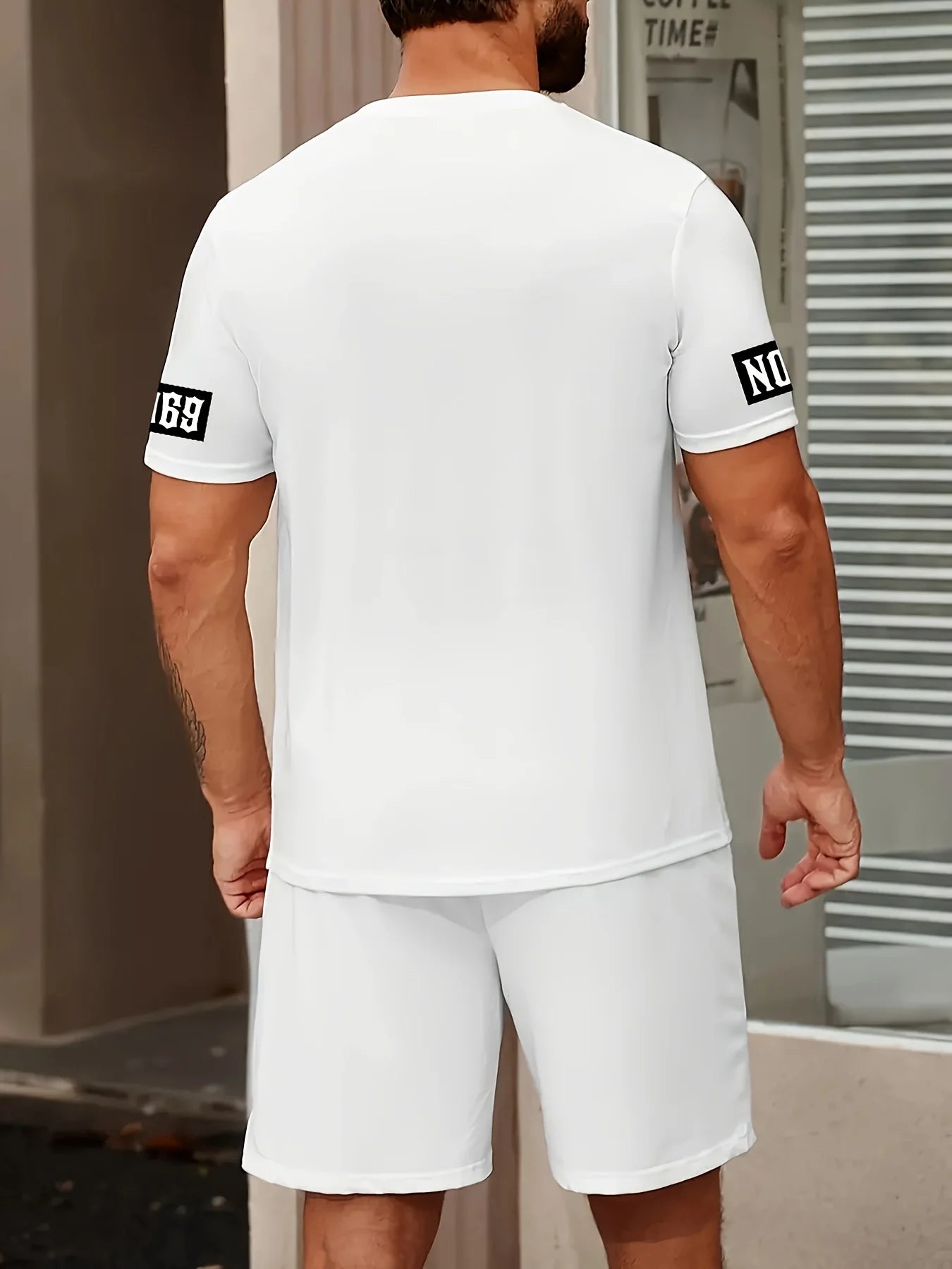 men's suit features a casual and fashionable T-shirt with a letter print pattern, short sleeves and shorts,