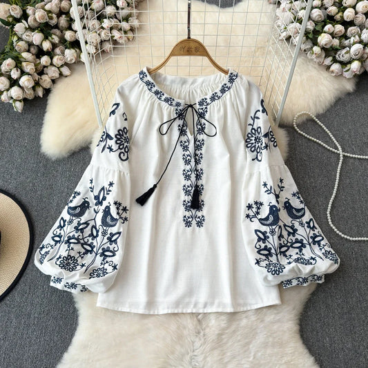 Retro Embroidered Lace-Up Tassel V-Neck Lantern Sleeve Top