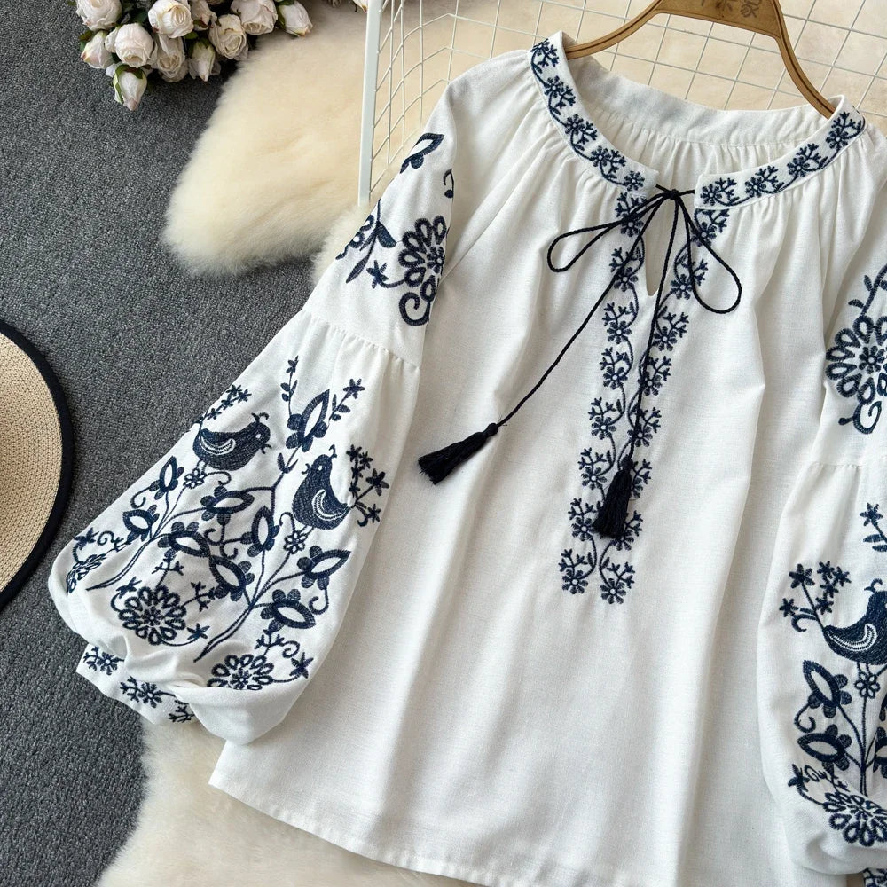 Retro Embroidered Lace-Up Tassel V-Neck Lantern Sleeve Top