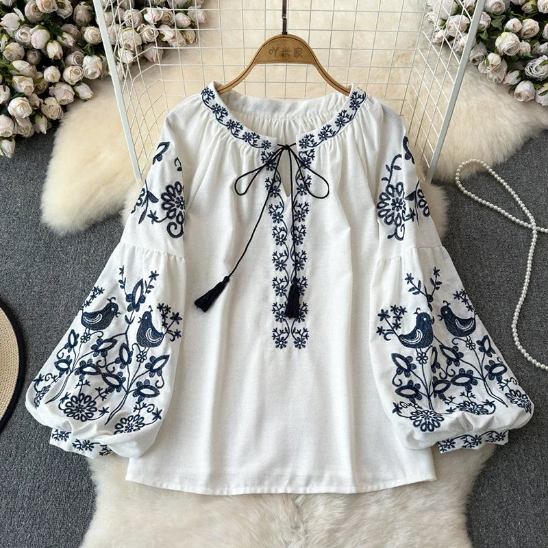 Retro Embroidered Lace-Up Tassel V-Neck Lantern Sleeve Top