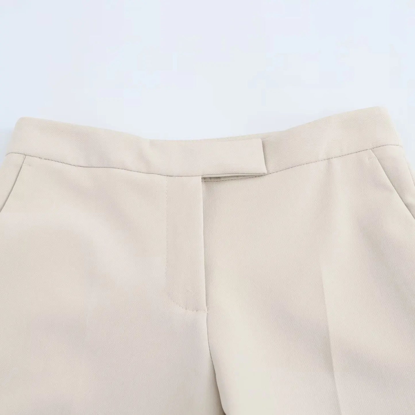 Women's clothing with padded shoulders, slim lapel, long-sleeved casual suit jacket, mid-waist flared pants