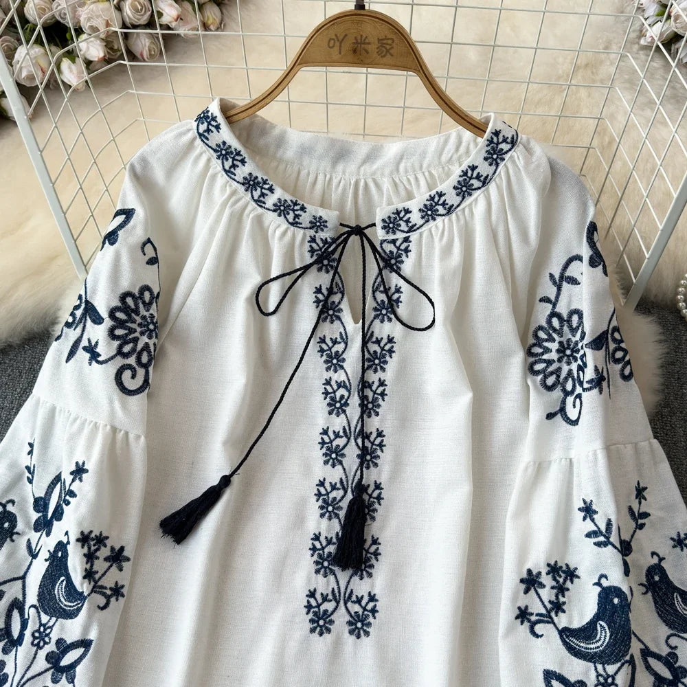 Retro Embroidered Lace-Up Tassel V-Neck Lantern Sleeve Top