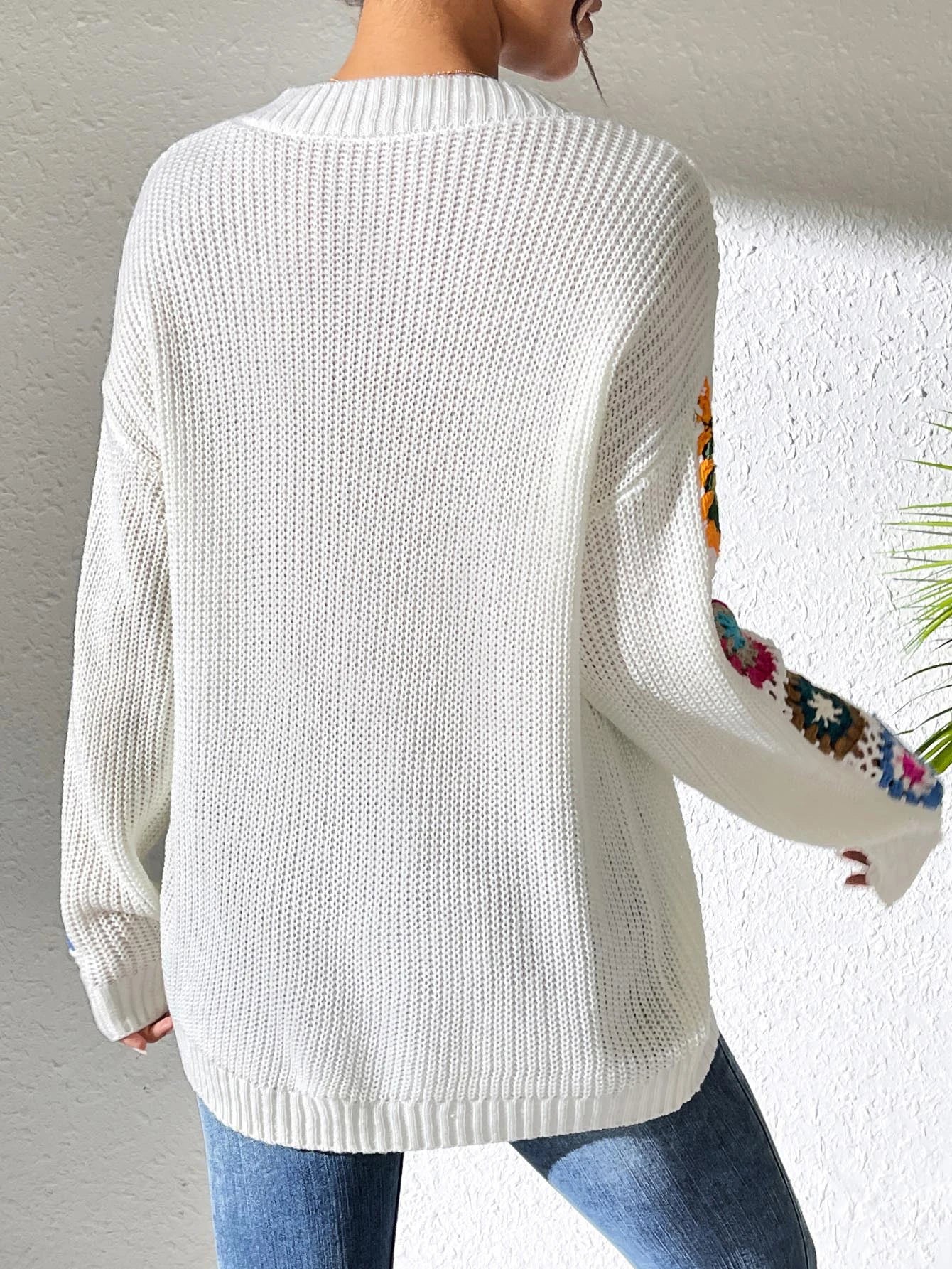 Elegant Solid Color Sweater With Embroidery Design, Unique Cuff Detail, Suitable For All Occasions