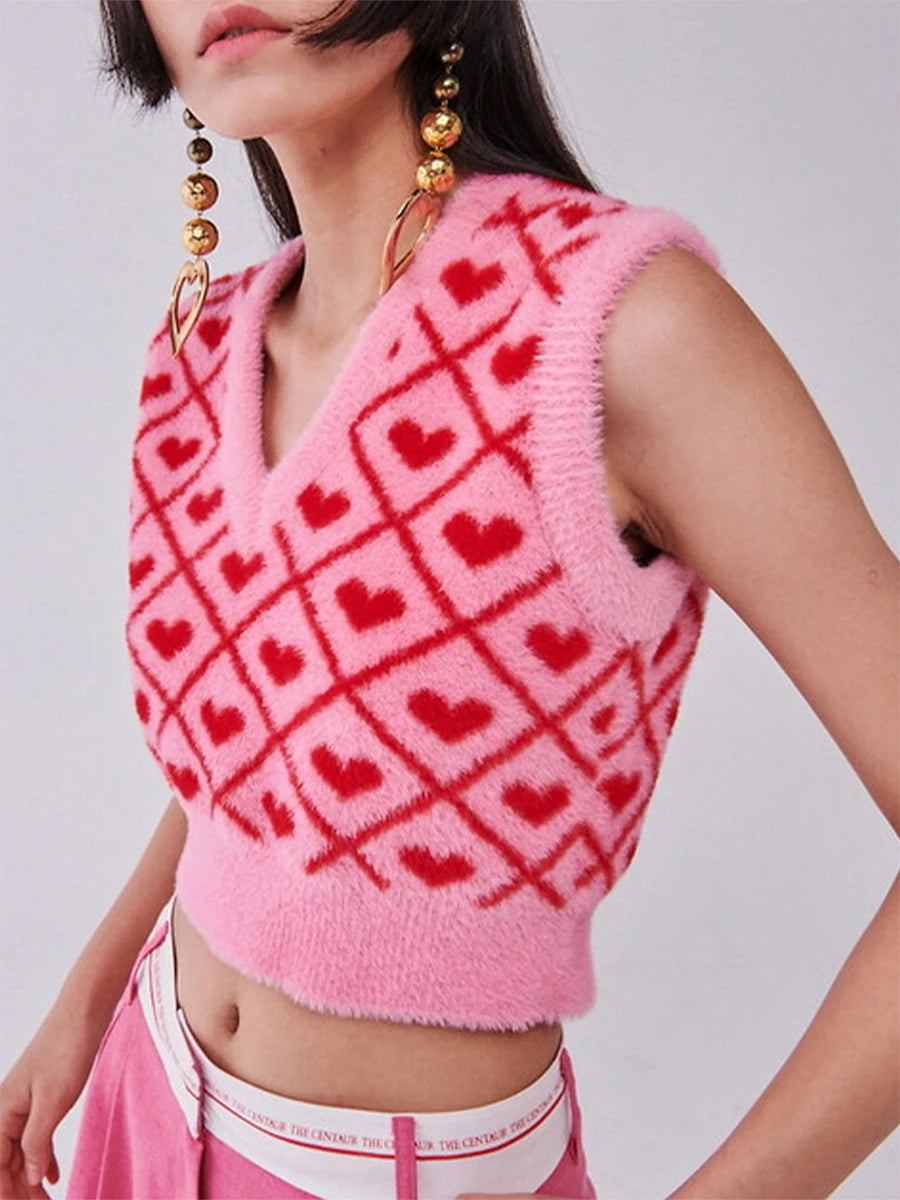 Women s Cozy Sleeveless Sweater Vest with Deep V Neckline and Heart Print Detail