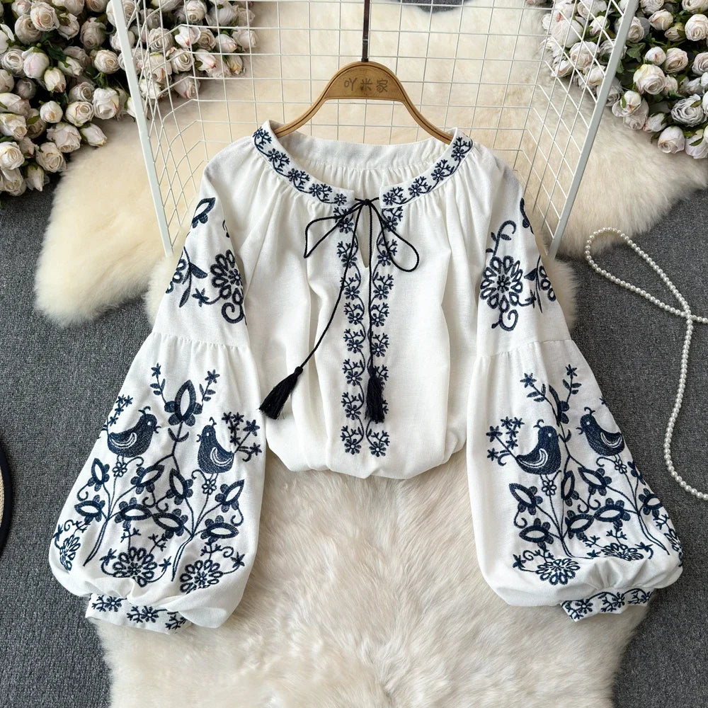 Retro Embroidered Lace-Up Tassel V-Neck Lantern Sleeve Top