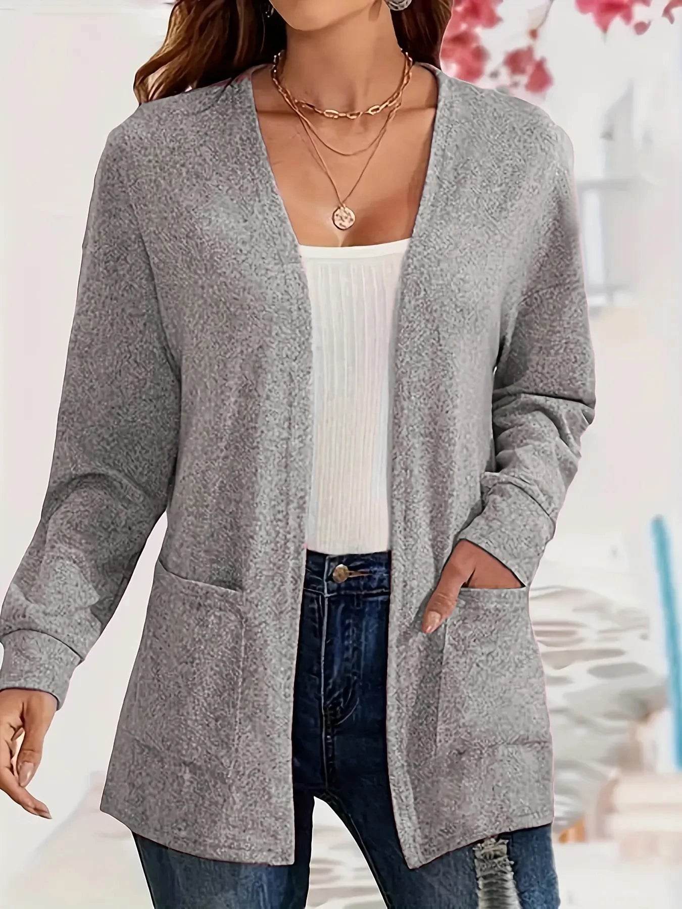 European and American foreign trade thin fashion solid color pocket thin knitted women's buttonless cardigan